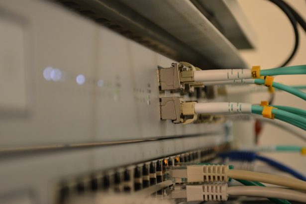 a bunch of wires are connected to a wall